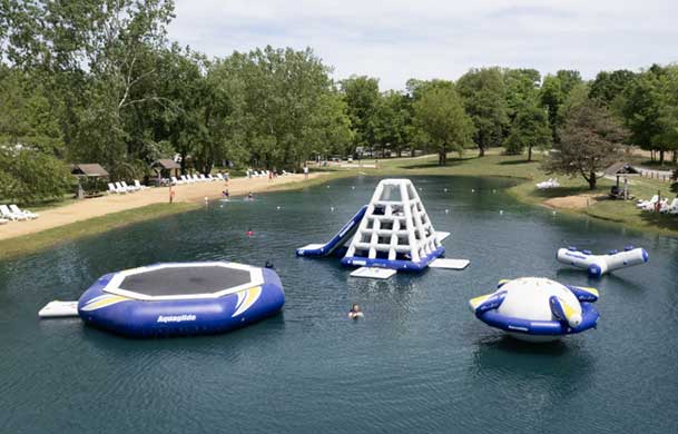 Aquaglide water inflatables on the swimming pond at Green Valley
